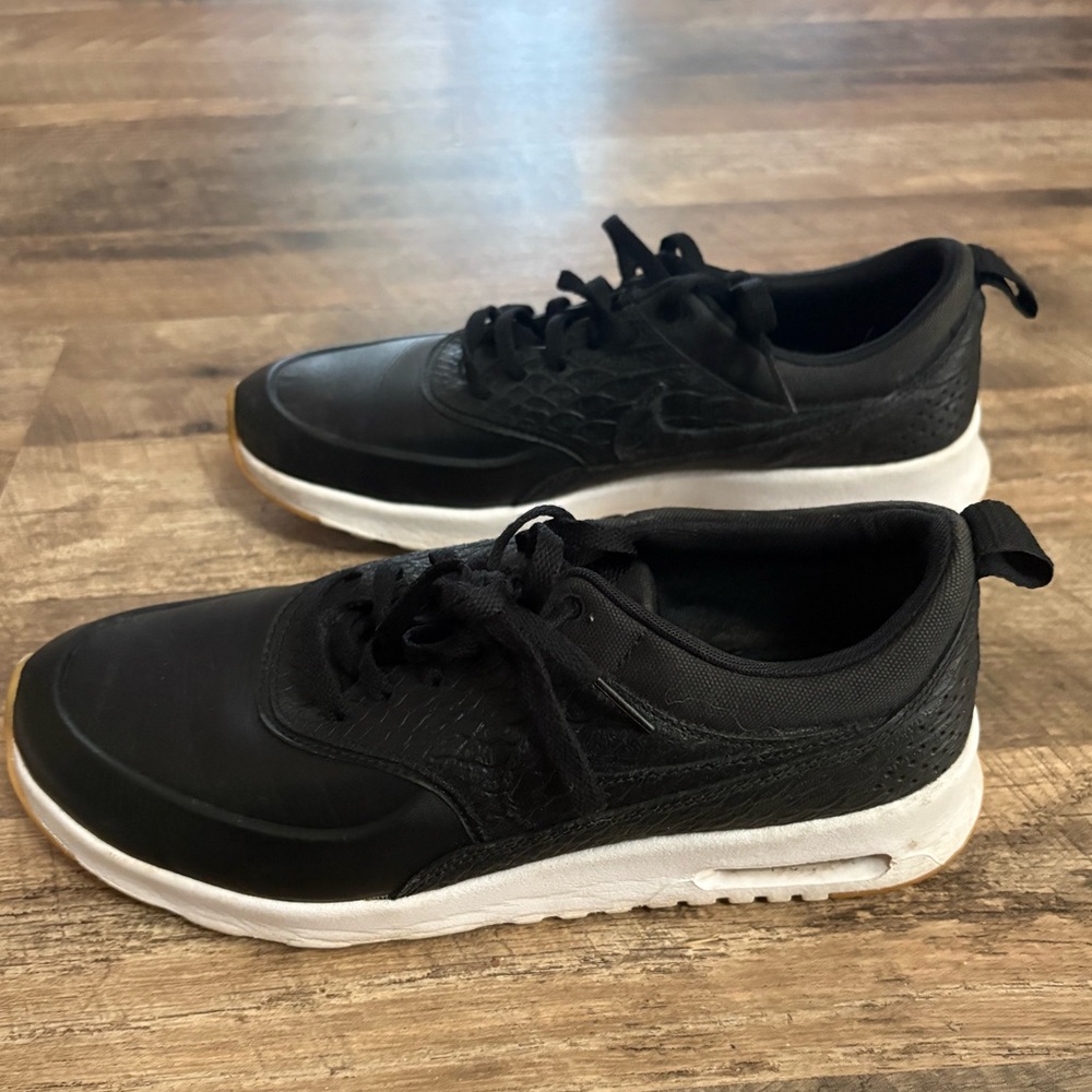 Nike Air Max Thea sneakers in black with a snakeskin-like texture